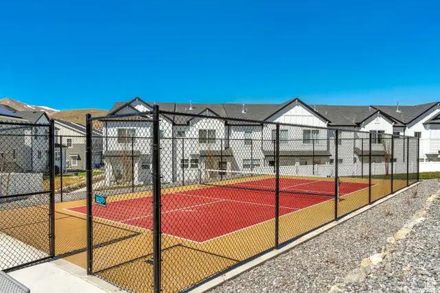 4357 E Longleaf Ln, Eagle Mountain, UT 84005 - view of sport court with a tennis court and a residential view