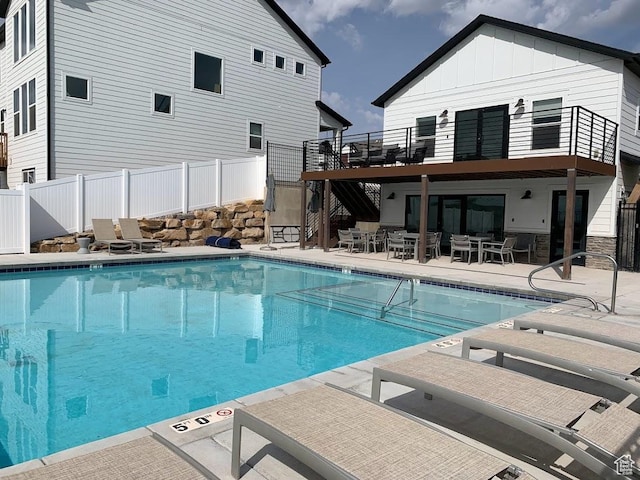 4357 E Longleaf Ln, Eagle Mountain, UT 84005 - community pool with stairs, a patio area, outdoor dining area, and a deck