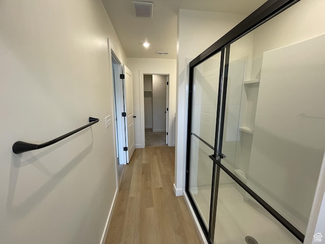 4357 E Longleaf Ln, Eagle Mountain, UT 84005 - corridor with light wood-style flooring and baseboards