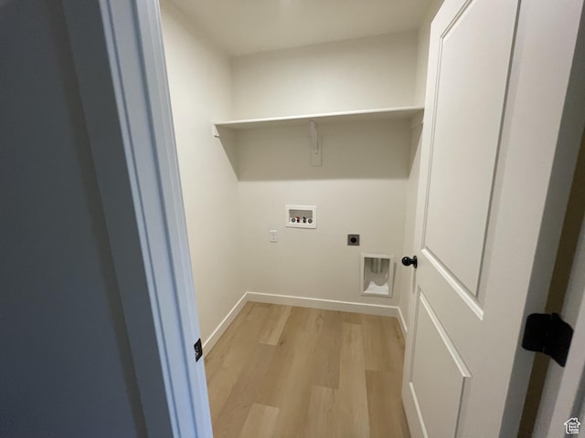 4357 E Longleaf Ln, Eagle Mountain, UT 84005 - laundry room featuring hookup for a washing machine, electric dryer hookup, light wood-style flooring, and baseboards