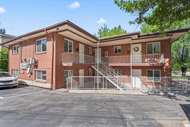902 E 500 S Unit E, Salt Lake City, UT 84102 - view of property featuring uncovered parking