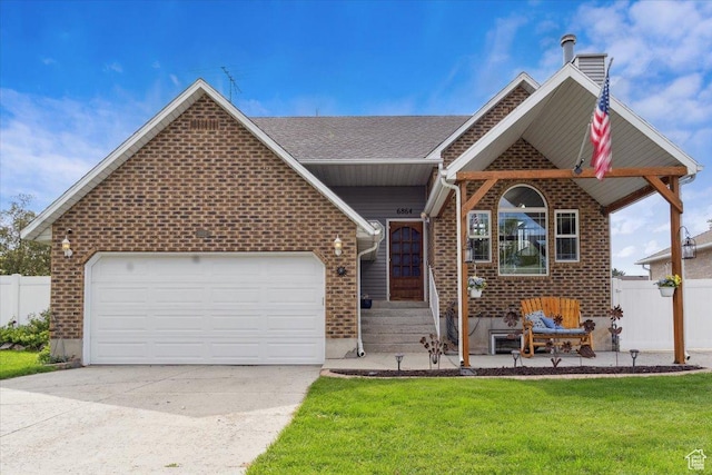 6864 S 3370 W, West Jordan, UT 84084 - view of front of house with concrete driveway, a garage, brick siding, and a chimney