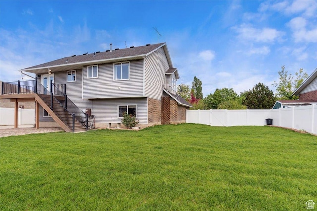 6864 S 3370 W, West Jordan, UT 84084 - rear view of house featuring stairs and a wooden deck