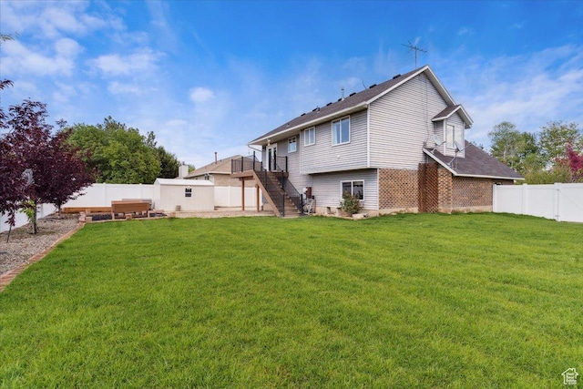 6864 S 3370 W, West Jordan, UT 84084 - back of property featuring stairway and brick siding