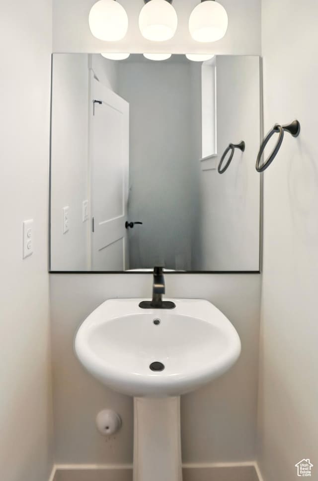 1316 E 1150 S, Garland, UT 84312 - bathroom with a sink and baseboards