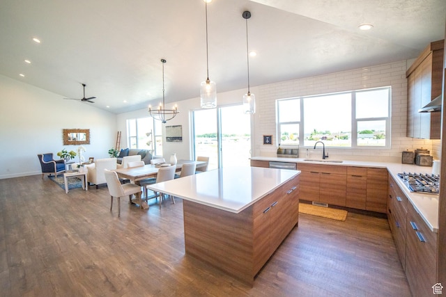 60 S Main, Glenwood, UT 84730 - kitchen with a sink, stainless steel gas stovetop, dark wood-type flooring, brown cabinetry, and open floor plan