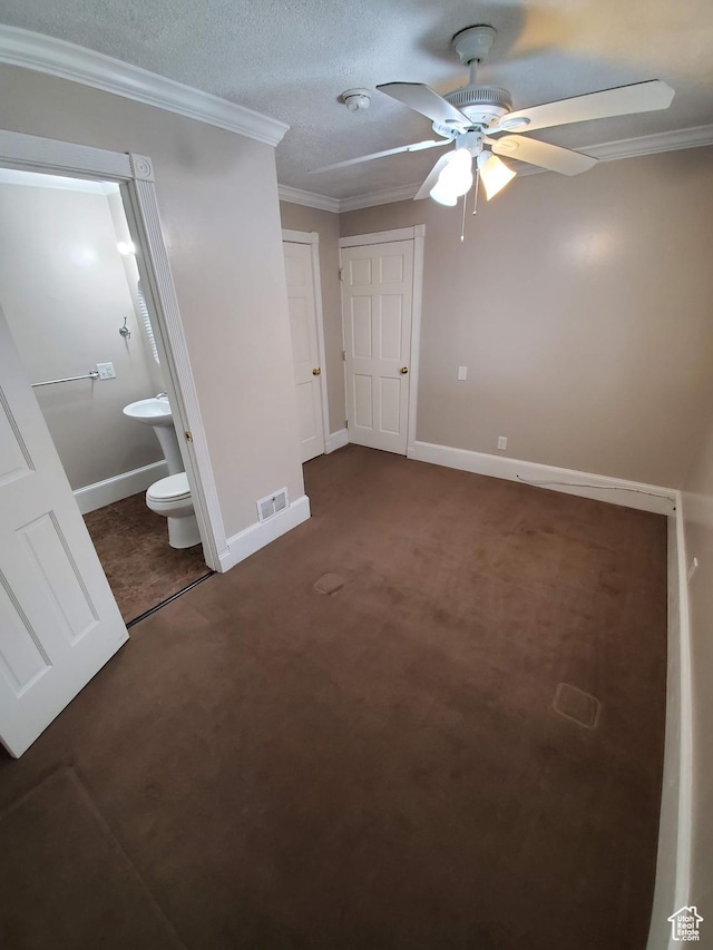 827 E Third Ave N, Salt Lake City, UT 84103 - unfurnished bedroom featuring crown molding, connected bathroom, carpet floors, baseboards, and ceiling fan