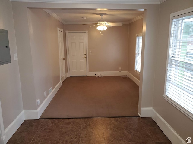827 E Third Ave N, Salt Lake City, UT 84103 - spare room with electric panel, a ceiling fan, crown molding, baseboards, and carpet flooring