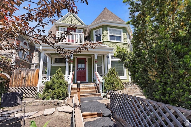 827 E Third Ave N, Salt Lake City, UT 84103 - victorian home with a porch and a balcony
