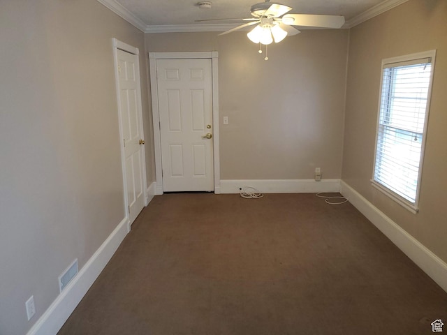 827 E Third Ave N, Salt Lake City, UT 84103 - unfurnished room featuring ornamental molding, dark carpet, ceiling fan, healthy amount of natural light, and baseboards