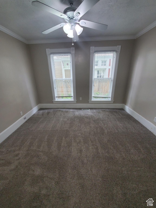 827 E Third Ave N, Salt Lake City, UT 84103 - unfurnished room featuring plenty of natural light, carpet floors, crown molding, baseboards, and a textured ceiling