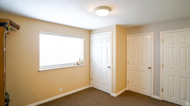 146 S 1125 W, Layton, UT 84041 - unfurnished bedroom featuring dark carpet and baseboards