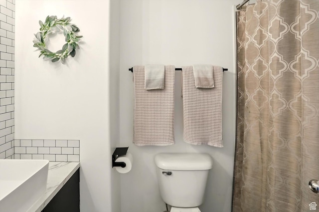 146 S 1125 W, Layton, UT 84041 - bathroom with toilet, vanity, and a shower with shower curtain