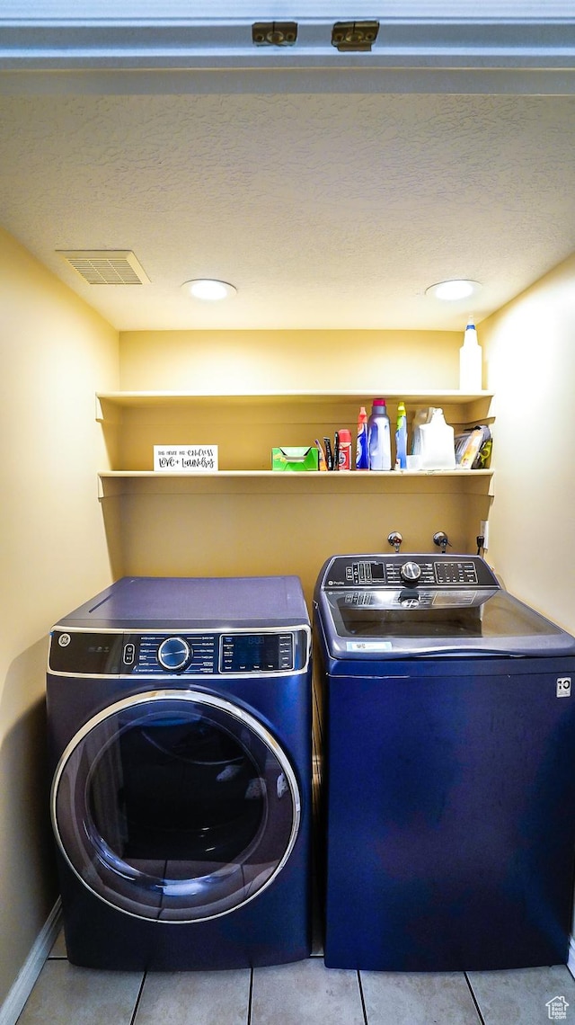 146 S 1125 W, Layton, UT 84041 - washroom featuring washer and clothes dryer and tile patterned floors