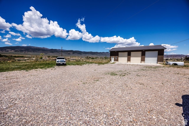 1085 S S River Ridge Ln, Joseph, UT 84739 - view of yard featuring a mountain view, a garage, and an outbuilding