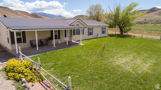 1085 S S River Ridge Ln, Joseph, UT 84739 - back of property featuring a mountain view and metal roof