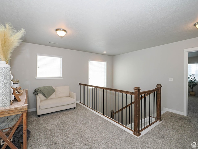 957 W Mckenna Rd, Bluffdale, UT 84065 - living area with carpet, healthy amount of natural light, an upstairs landing, and baseboards