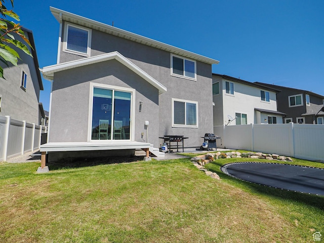 957 W Mckenna Rd, Bluffdale, UT 84065 - rear view of property featuring stucco siding