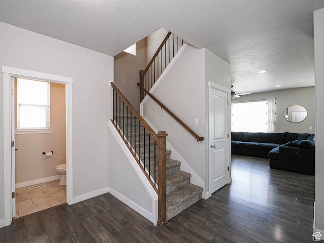 957 W Mckenna Rd, Bluffdale, UT 84065 - staircase with a textured ceiling, wood finished floors, baseboards, a ceiling fan, and recessed lighting