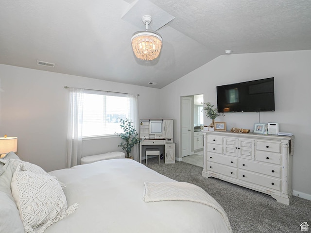 957 W Mckenna Rd, Bluffdale, UT 84065 - bedroom with vaulted ceiling, carpet, a chandelier, baseboards, and ensuite bath