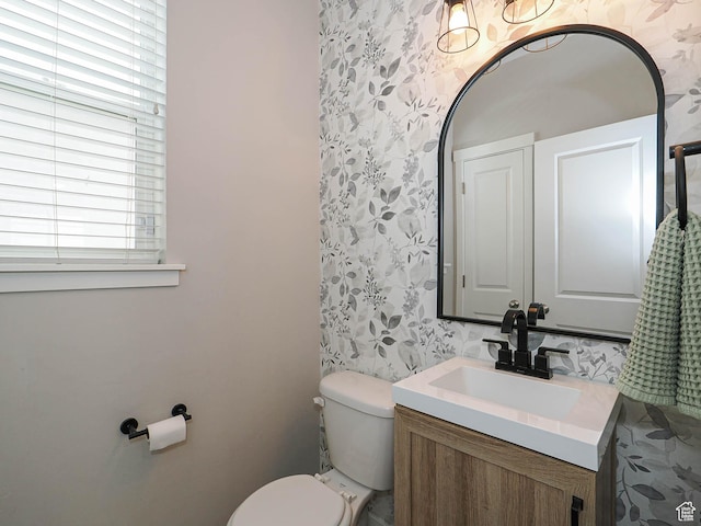 957 W Mckenna Rd, Bluffdale, UT 84065 - bathroom featuring wallpapered walls, vanity, and toilet