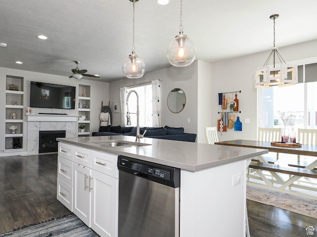 957 W Mckenna Rd, Bluffdale, UT 84065 - kitchen with stainless steel dishwasher, a sink, open floor plan, ceiling fan, and dark wood-style flooring