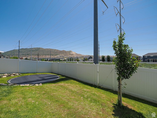957 W Mckenna Rd, Bluffdale, UT 84065 - view of yard featuring a mountain view and a trampoline