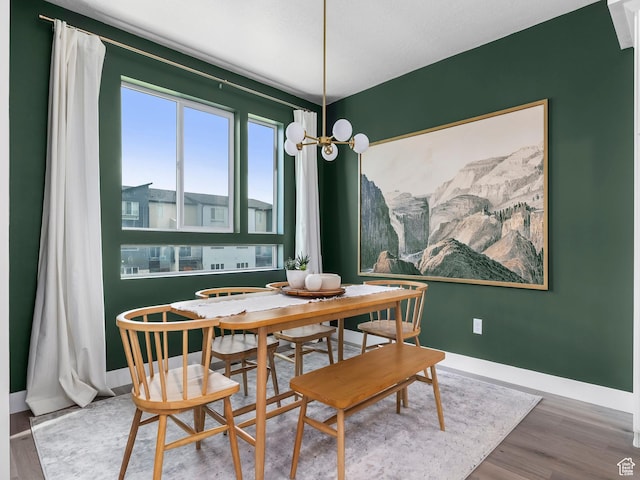 1031 W 360 S, American Fork, UT 84003 - dining area with wood finished floors, a chandelier, and baseboards