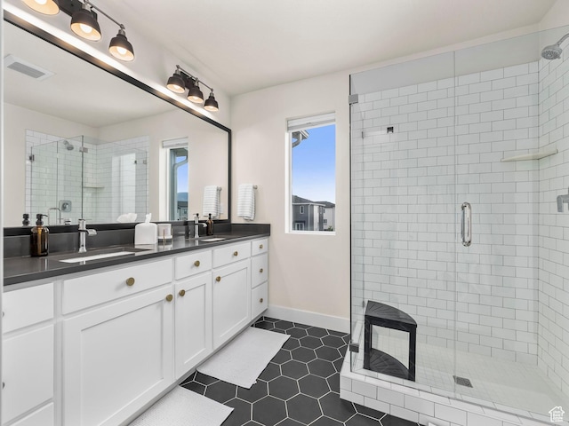 1031 W 360 S, American Fork, UT 84003 - bathroom featuring a shower stall, double vanity, and tile patterned floors