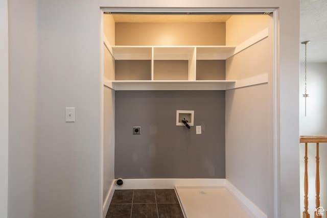 5242 W Cool Water Way S, West Jordan, UT 84081 - washroom featuring hookup for an electric dryer, hookup for a washing machine, dark tile patterned flooring, and baseboards