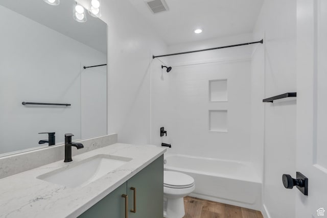 515 N 600 E, Spanish Fork, UT 84660 - bathroom featuring vanity, toilet, wood finished floors, shower / washtub combination, and recessed lighting