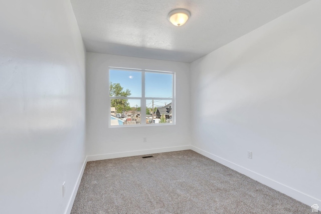 515 N 600 E, Spanish Fork, UT 84660 - carpeted empty room featuring baseboards and a textured ceiling