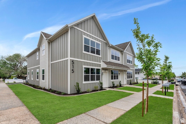 515 N 600 E, Spanish Fork, UT 84660 - view of front of home featuring board and batten siding, a front yard, and a shingled roof