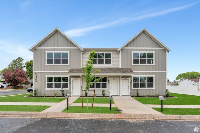 515 N 600 E, Spanish Fork, UT 84660 - view of front of home with board and batten siding, a garage, driveway, and a shingled roof