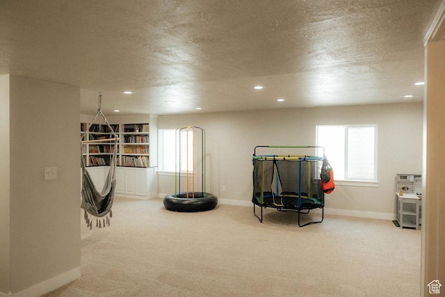 217 S 1230 W Unit 15, Spanish Fork, UT 84660 - recreation room featuring baseboards, carpet, healthy amount of natural light, recessed lighting, and a textured ceiling