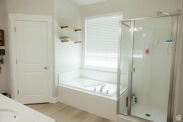 217 S 1230 W Unit 15, Spanish Fork, UT 84660 - full bath featuring a shower stall, wood finished floors, a bath, and vanity