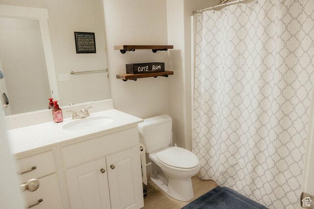 217 S 1230 W Unit 15, Spanish Fork, UT 84660 - bathroom featuring toilet, vanity, and curtained shower
