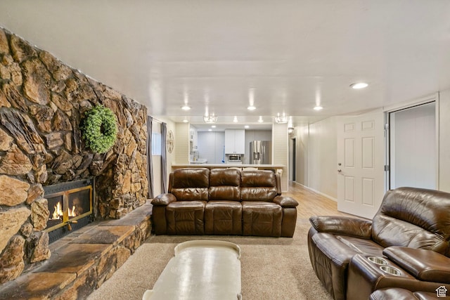 177 S Canyon Ave, Springville, UT 84663 - living room with a stone fireplace, recessed lighting, and light colored carpet