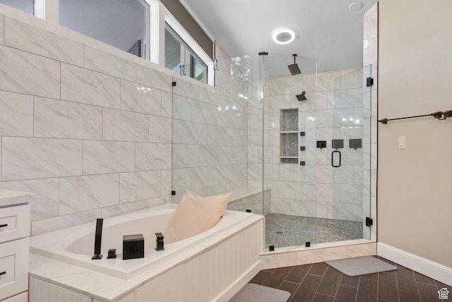 177 S Canyon Ave, Springville, UT 84663 - full bath featuring a stall shower, a bath, wood tiled floors, and baseboards