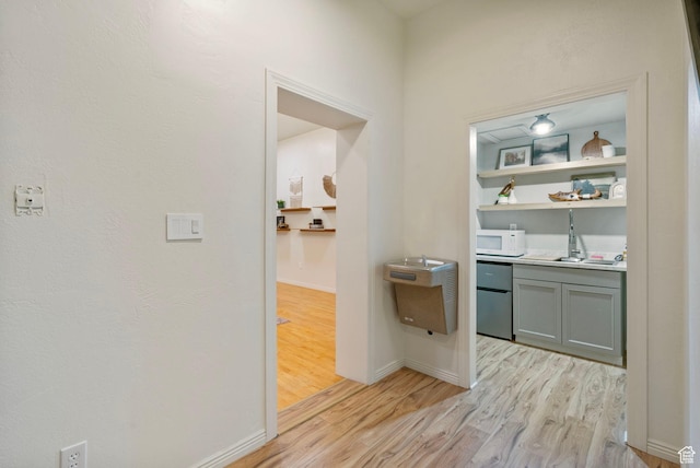 177 S Canyon Ave, Springville, UT 84663 - corridor featuring light wood-style flooring and baseboards