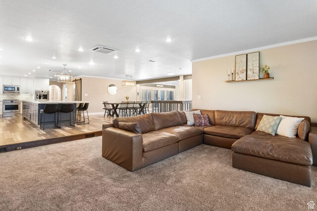 177 S Canyon Ave, Springville, UT 84663 - living area featuring ornamental molding, recessed lighting, and light carpet