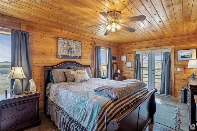 9911 S Antelope Xing, Duchesne, UT 84021 - bedroom featuring access to exterior, multiple windows, wooden ceiling, wooden walls, and french doors