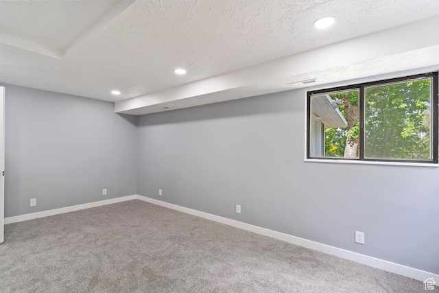 4203 S College Dr E, Ogden, UT 84403 - basement with carpet floors, recessed lighting, baseboards, and a textured ceiling
