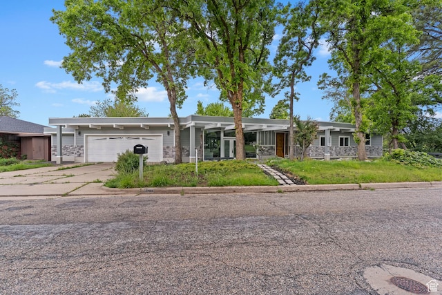 4203 S College Dr E, Ogden, UT 84403 - mid-century home with an attached garage and driveway