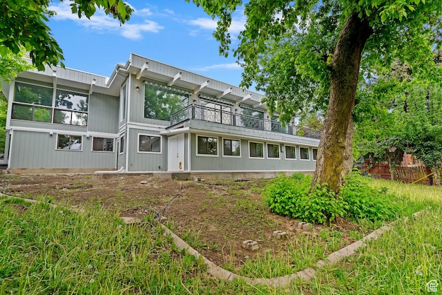 4203 S College Dr E, Ogden, UT 84403 - rear view of house with a balcony