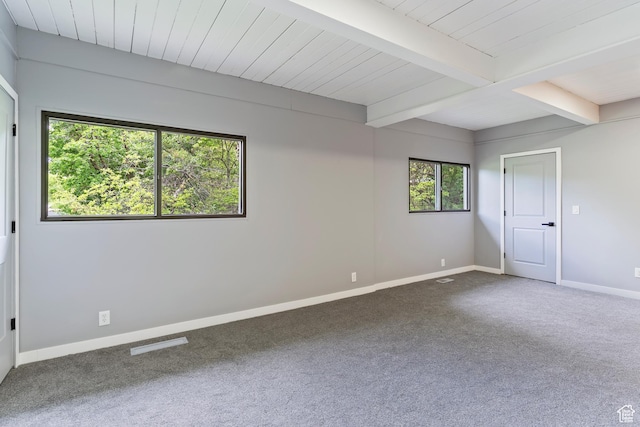 4203 S College Dr E, Ogden, UT 84403 - carpeted empty room featuring baseboards and beam ceiling