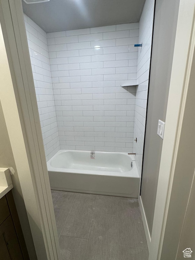 1234 N 4950 W, Plain City, UT 84404 - bathroom featuring tile patterned flooring, vanity, shower / tub combination, and baseboards