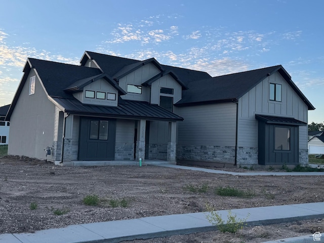 1234 N 4950 W, Plain City, UT 84404 - modern farmhouse with a standing seam roof, board and batten siding, a porch, metal roof, and stone siding