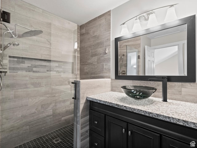 3095 W 8525 S, West Jordan, UT 84088 - full bath with a shower stall, vanity, tile walls, and tasteful backsplash