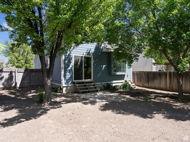 3095 W 8525 S, West Jordan, UT 84088 - rear view of house with entry steps